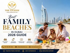 Best family beaches in Dubai featuring a happy family enjoying a sandy beach with the Burj Al Arab and Dubai skyline in the background – 2026 travel guide by NSB Tourism