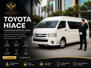 Black Toyota Hiace luxury 12-seater van with a professional chauffeur outside a premium Dubai hotel, offering airport transfers, corporate group transportation, family travel, city tours, hotel transfers, and VIP chauffeur service by NSB Luxury Transport.